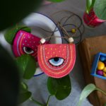 ADELA – Collar "ojo" con fondo salmón
